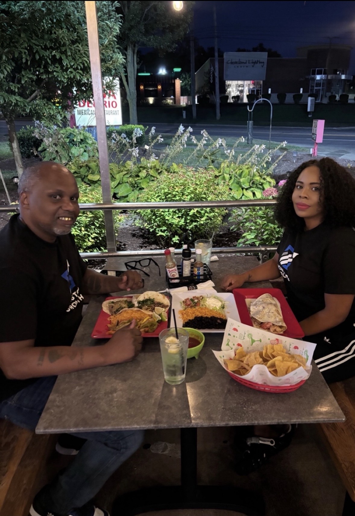 Marcel and Mia McDaniel sharing a meal at a local restaurant.
