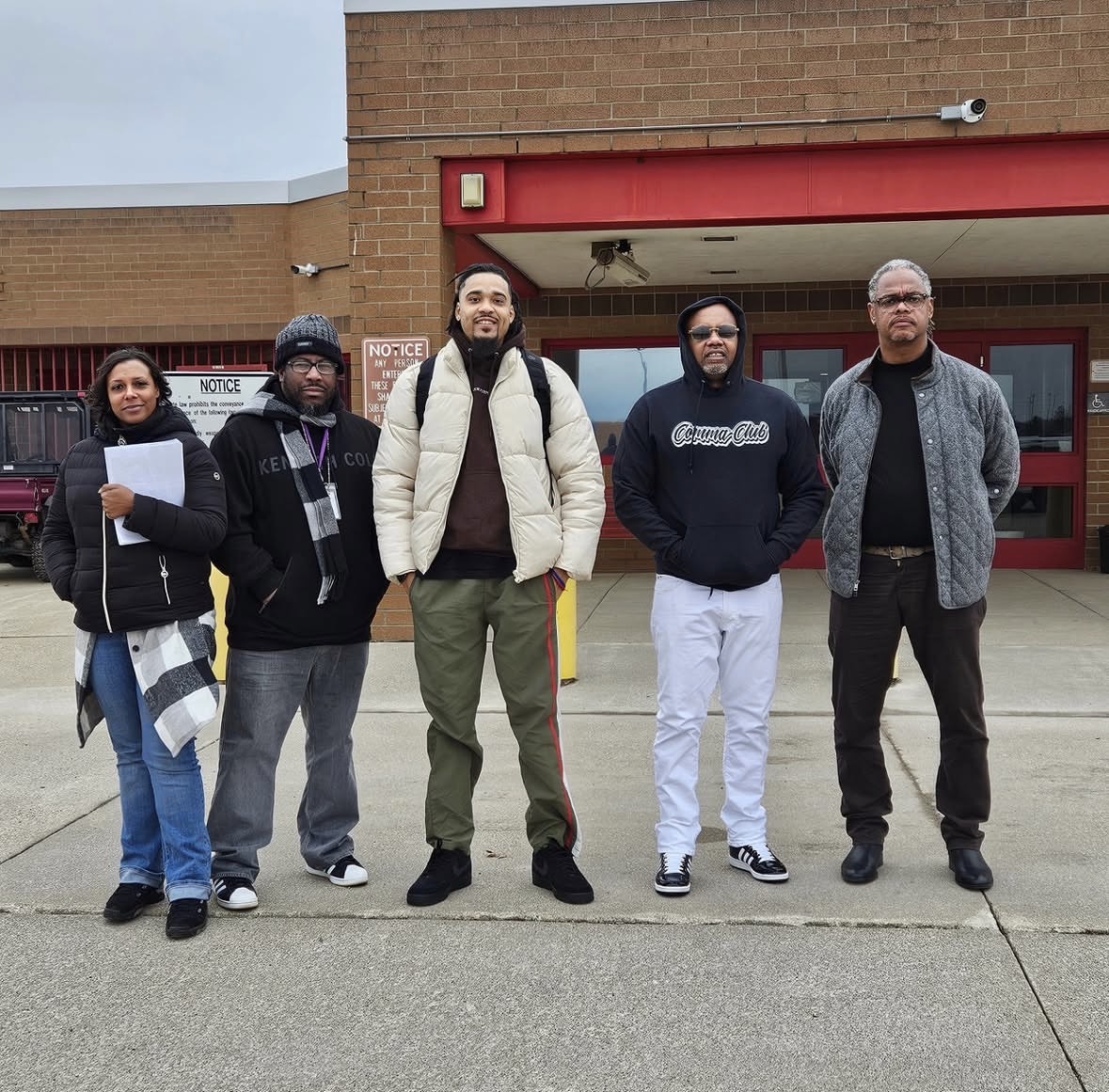 John Morgan Jr., Marcel McDaniel, Dr. Curtis Williams and team members standing outside Grafton Correctional Institution.